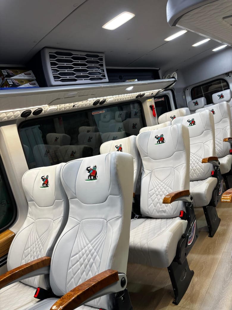 Interior seating of a Tempo Traveller used for group travel